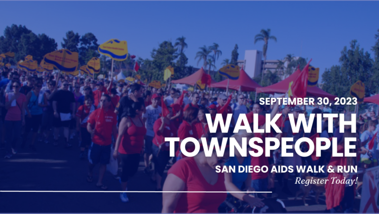 White text on a blue-toned color photo of participants in a past AIDS Walk & Run San Diego event. Text says, "September 30, 2023. Walk with Townspeople. San Diego AIDS WAlk & Run. Register today!"