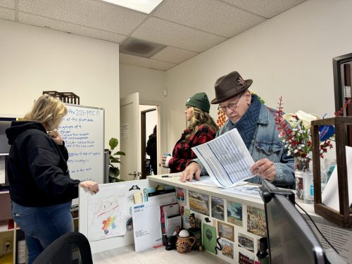 Steve Russell, Executive Director of the San Diego Housing Federation, signs in for #WeAllCount 2026.